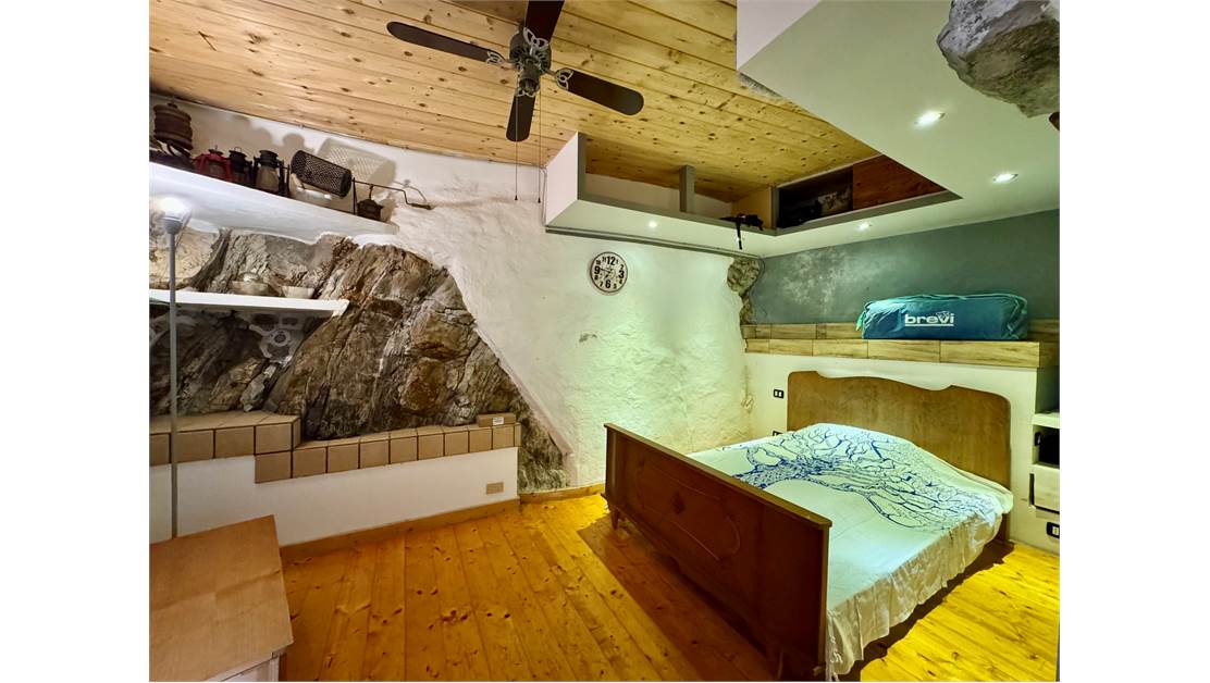 Two-level village house with storage room and land