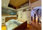 Two-level village house with storage room and land