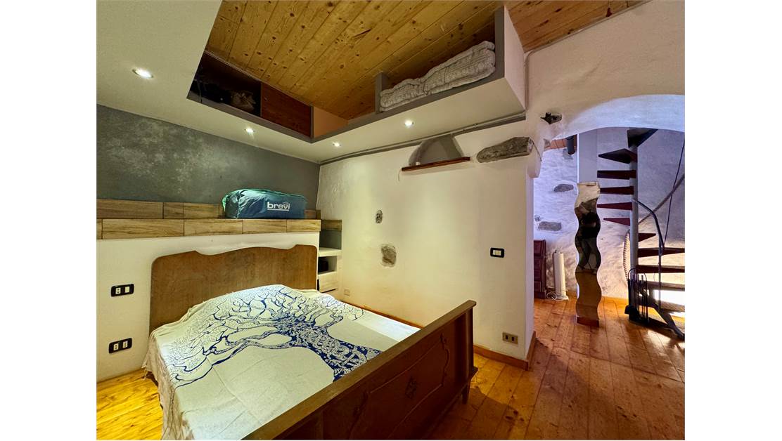 Two-level village house with storage room and land