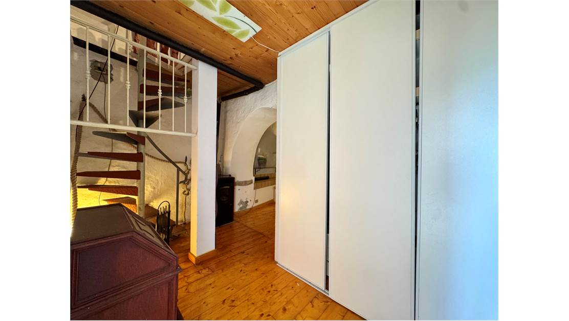 Two-level village house with storage room and land