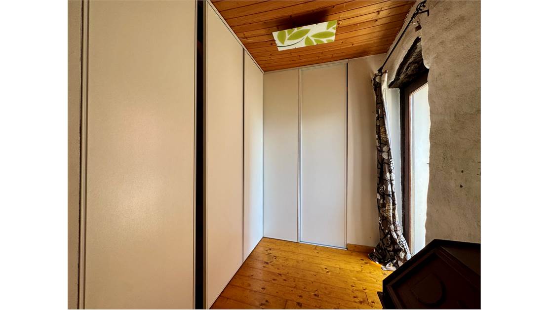 Two-level village house with storage room and land