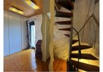 Two-level village house with storage room and land