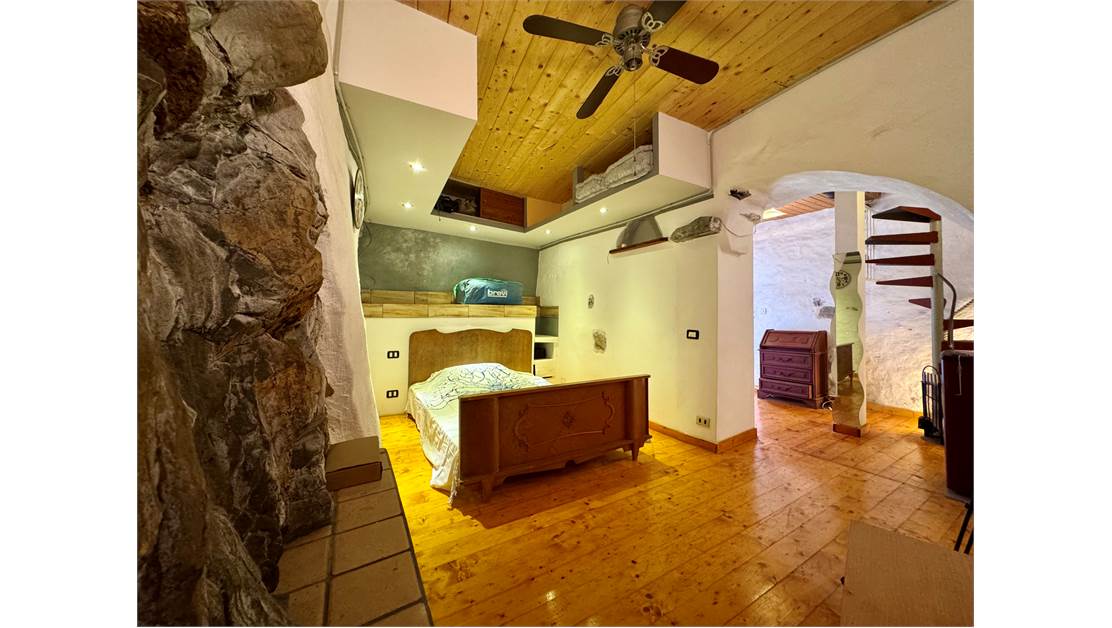 Two-level village house with storage room and land