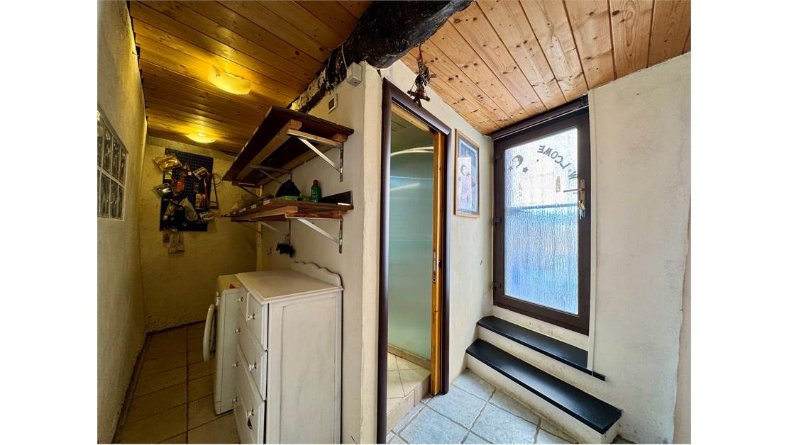 Two-level village house with storage room and land