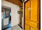 Two-level village house with storage room and land