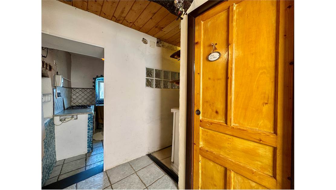 Two-level village house with storage room and land